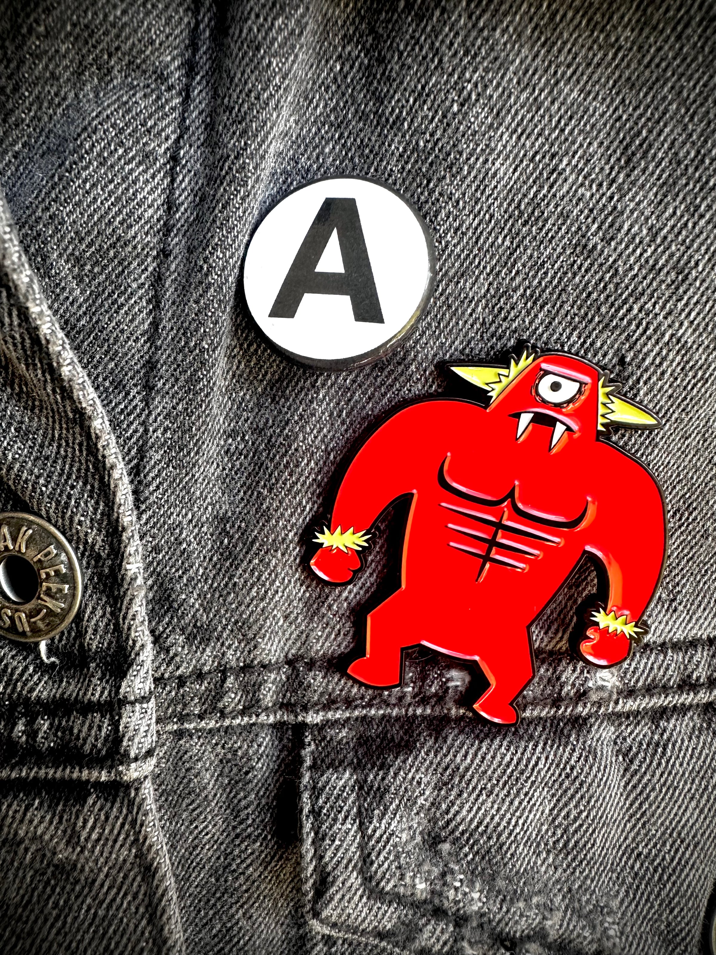 Cyclopsis Enamel Pin